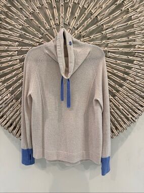 Cortland Park Cashmere cowl-neck sweater.